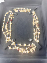 Chanel 17A limited edition long pearl necklace with links , and blue/red beads